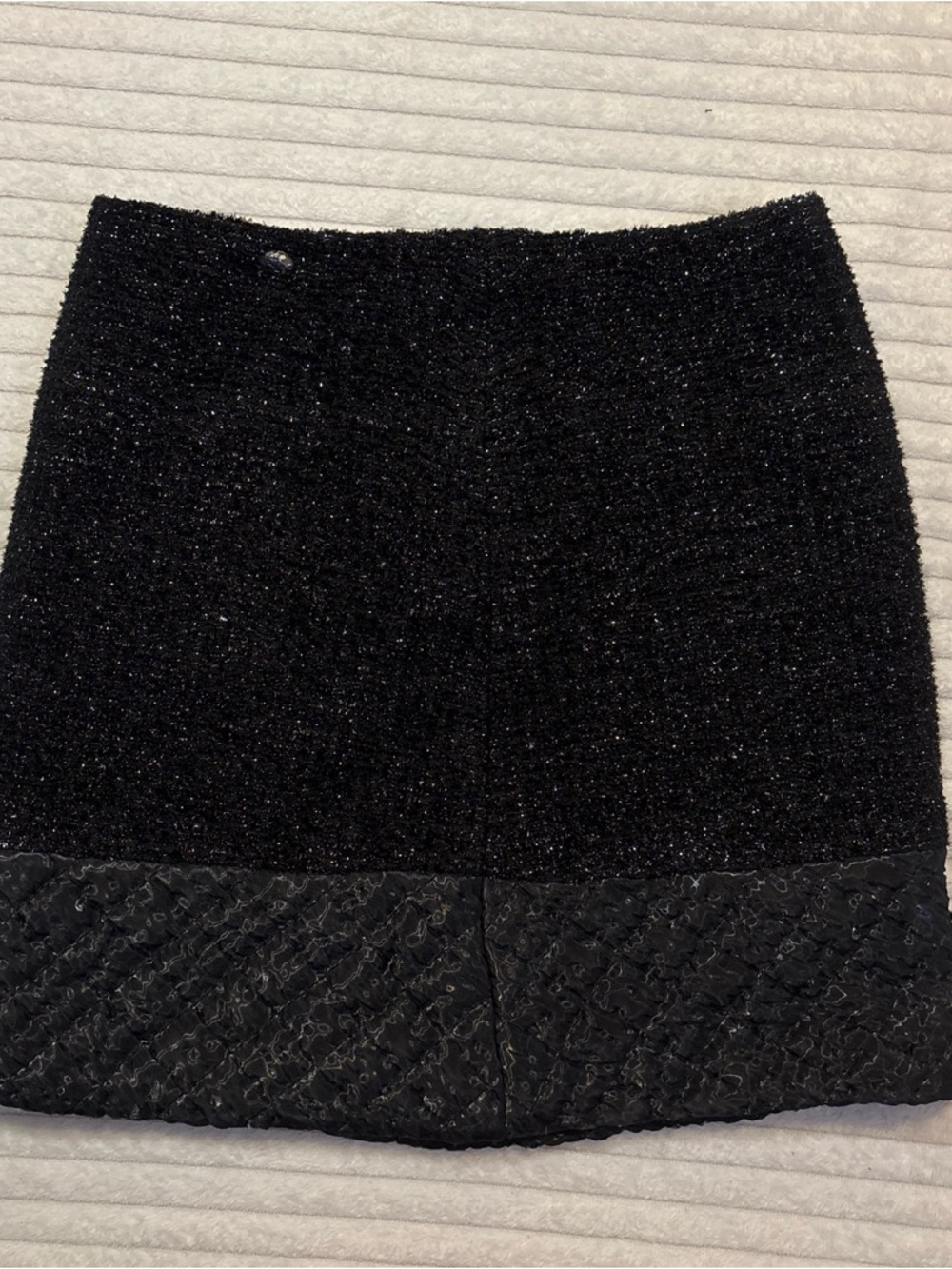 CHANEL Black Sparkle Tweed Mini Skirt with Quilted Hem